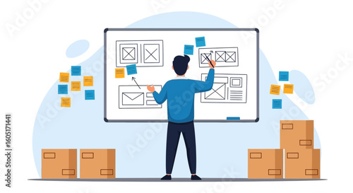 Person Designing Website Interface On Whiteboard With Shipping Boxes Nearby
