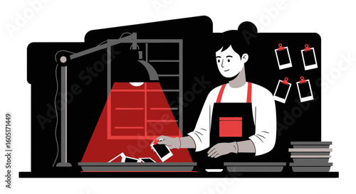 Person Developing Photographs In Darkroom With Safe Light And Photographic Equipment