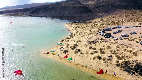 Wallpaper Mural Aerial view of a crowd of kitesurfers enjoying the waves on the beach of Sotavento, Fuerteventura Island, Spain. Torontodigital.ca