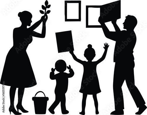 family decorating memory wall silhouette, family creating memory wall silhouette