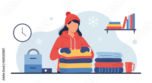 Woman Prepares Winter Clothes For Cold Season With Snowflake Decoration