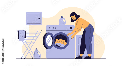 Woman Doing Laundry At Home Using Washing Machine For Cleaning Clothes
