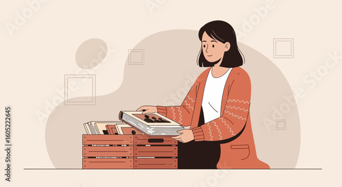 Woman Looking Through Pictures In Wooden Box Creating Memories Concept