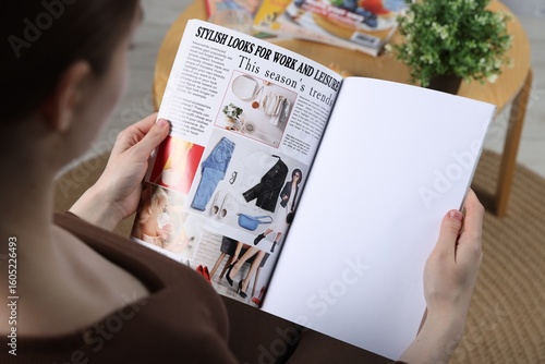 Woman reading magazine indoors, closeup. Mockup for design