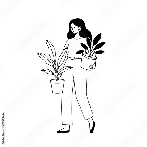 Young woman carrying potted plants while smiling at home  