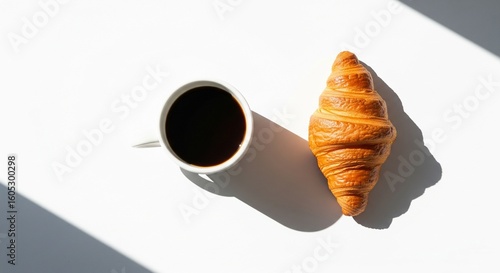 Morning Setup with Coffee and Fresh Croissant