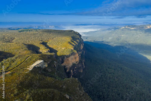 Drone aerial photograph of the picturesque and wide Jamison Valley taken from near the town of Wentworth Falls in the Blue Mountains, NSW, Australia.