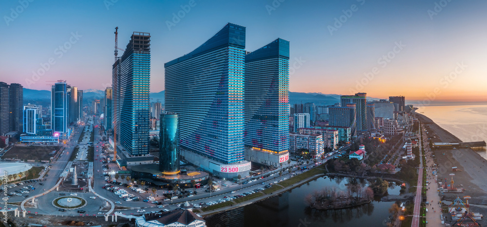 Obraz premium Modern skyline of Batumi at sunrise with beachfront and skyscrapers