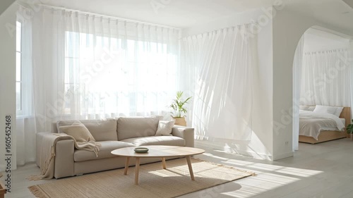 Sunlight illuminates a cozy living room with sheer curtains waving in wind