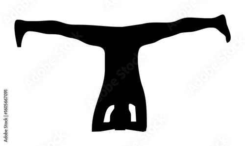 Silhouette of a person performing a yoga headstand pose.