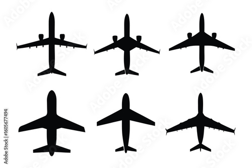 Aviation Armada: A fleet of airplanes of various designs, poised in a silhouette formation, embodies the essence of flight and travel.