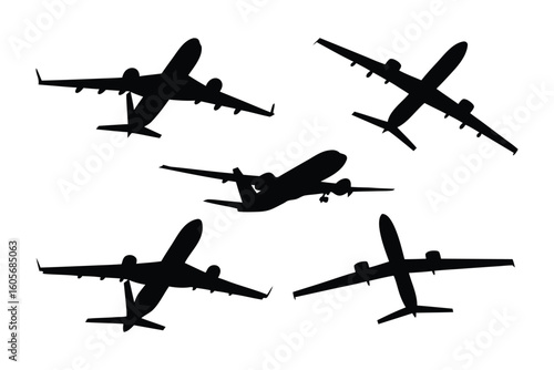 Airborne Fleet in Silhouette: A fleet of jet airplanes gracefully ascend into the vast sky, their silhouettes against a stark backdrop. Embodying the spirit of travel.