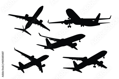 Soaring Silhouettes: A captivating collection of monochrome aircraft silhouettes gracefully traverse the expansive sky, ready to embark on new adventures 
