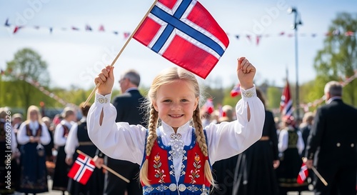 Young girl proudly displays a Norwegian flag.