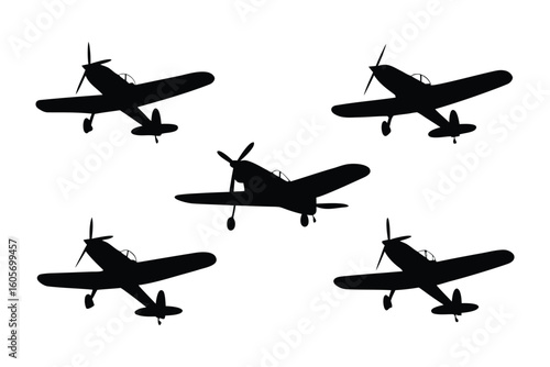 Silhouette of Vintage Airplanes: A dramatic monochrome representation of several vintage airplanes in flight, showcasing their classic forms and aerodynamic designs.