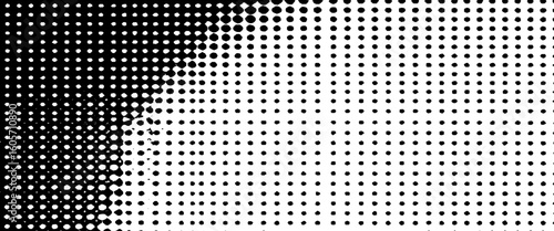 Grunge halftone gradient background faded dotted grit noise texture. Black and white rasterized sand wallpaper.