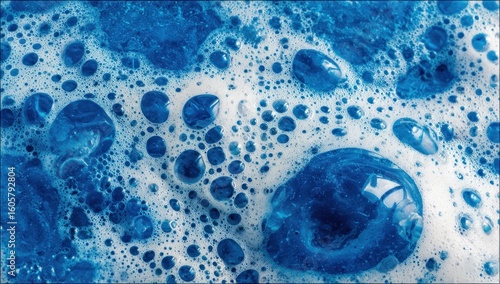 Close-up of blue bubbles in suds.