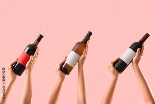 Female hands holding bottle...