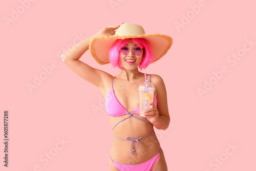 Happy young woman in swimsu...
