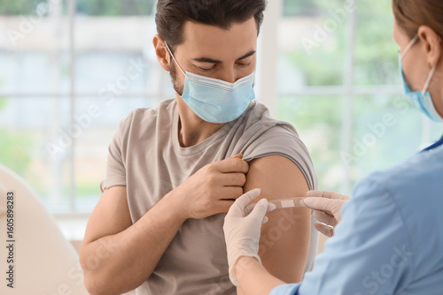 Young man with doctor apply...