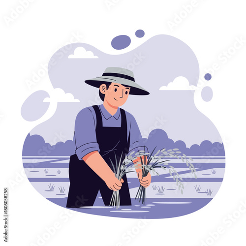 A young farmer wearing a hat and overalls harvests rice by hand in a flooded paddy field.