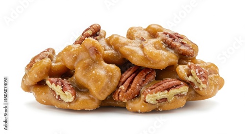 Isolated southern pecan praline candy cluster on a white background for culinary and dessert related imagery