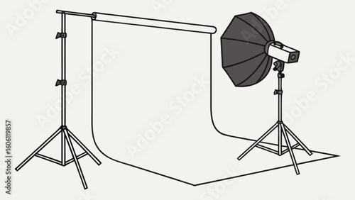Photography studio setup with backdrop stand and softbox lighting for professional photo and video shoots