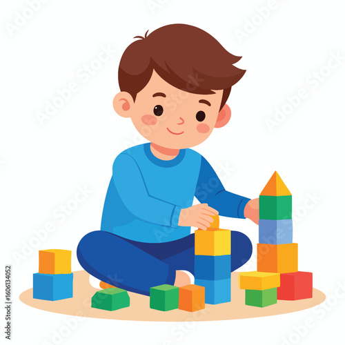 Smiling boy happily playing with colorful building blocks.
