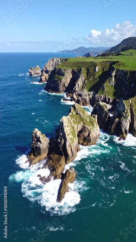 Coastal cliffs meet the sea