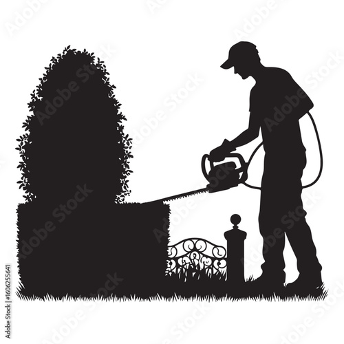 Silhouette of Landscaper Trimming Hedges with Power Equipment Outdoors