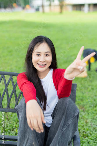 A picnic; a couple is celebrating in the park during the holidays.