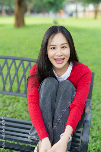 A picnic; a couple is celebrating in the park during the holidays.