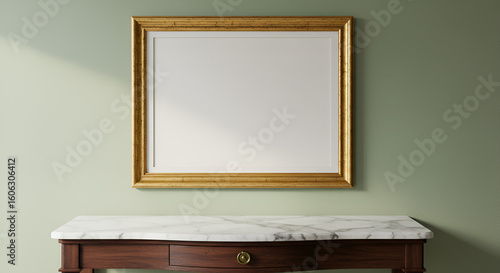 Empty golden frame on sage green wall