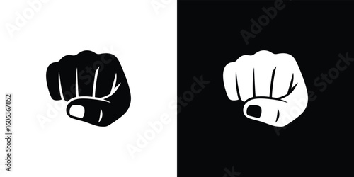 Black and white fist, clenching, fingers compressed, thumb extended,