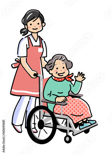 介護士と車椅子のシニア女性
