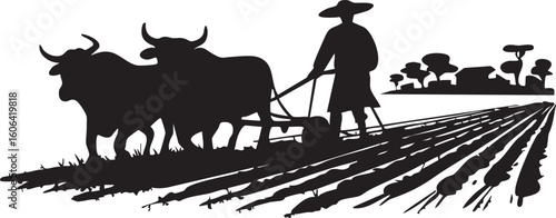 Silhouette of a farmer plowing a field with oxen and a plow against a backdrop of distant farm buildings
