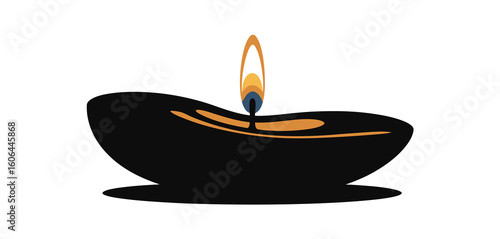 Elegant black candle with a warm glowing flame isolated on white background