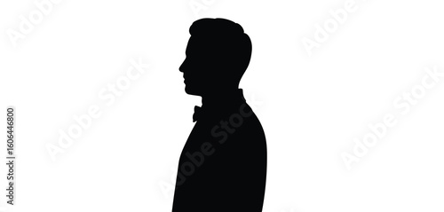 Silhouette of a man in a suit and bow tie facing left