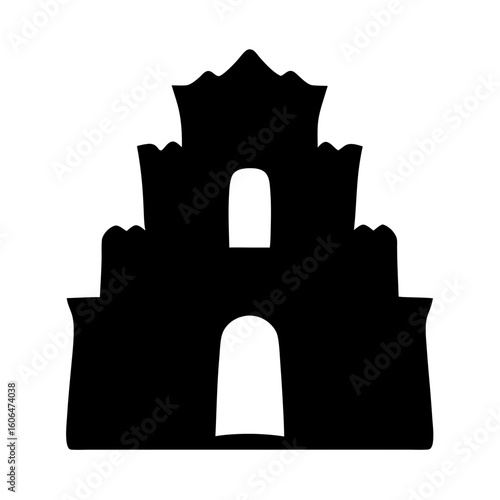 Silhouette of a multitiered architectural structure resembling a castle or fortress