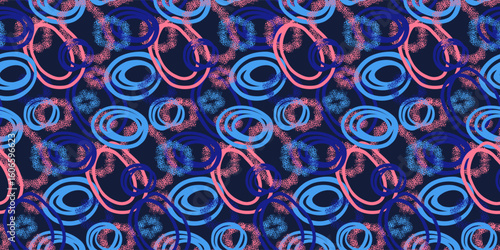 Dynamic seamless abstract pattern featuring overlapping circles in blue and pink shades with dotted textures on a dark navy background. Ideal for modern designs, fabric prints, and digital projects