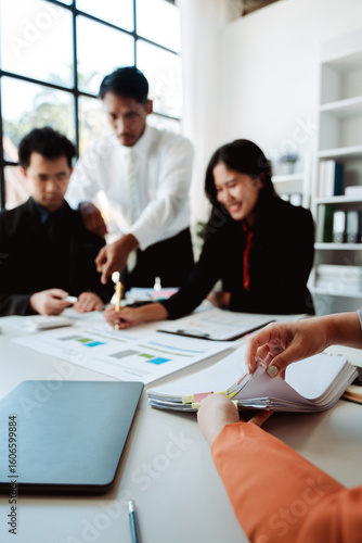 Brainstorming with colleagues on paperwork, marketing, taxes, and company finances.