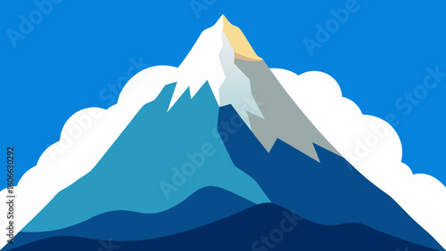 Behold the dramatic cloud draped summit of a towering mountain peak