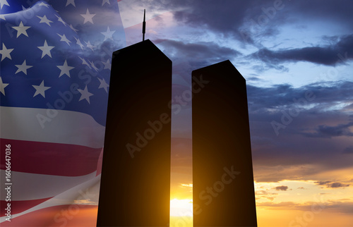 Twin Towers silhouette with USA flag against the sunset