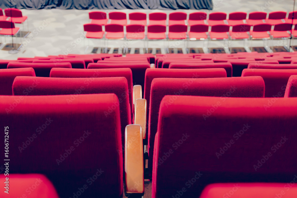Fototapeta premium red chair row in a convention centre