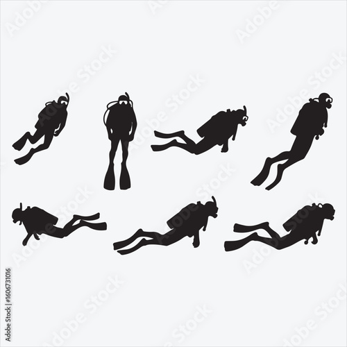 Scuba divers silhouettes underwater swimming ocean