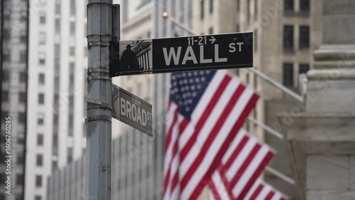 View of American flags and Wall Street sign in front of New York Stock Exchange, Lower Manhattan, New York, New York, USA, North America