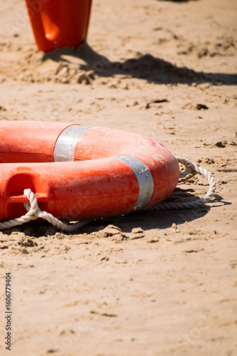 Lifering lifeguard on the beach sunny day