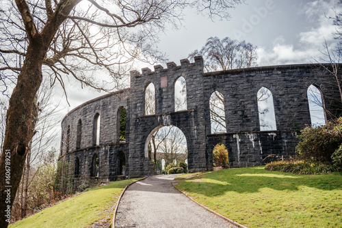 Wall Mural McCaigs Tower in Oban Scotland with Arched Stone Windows
