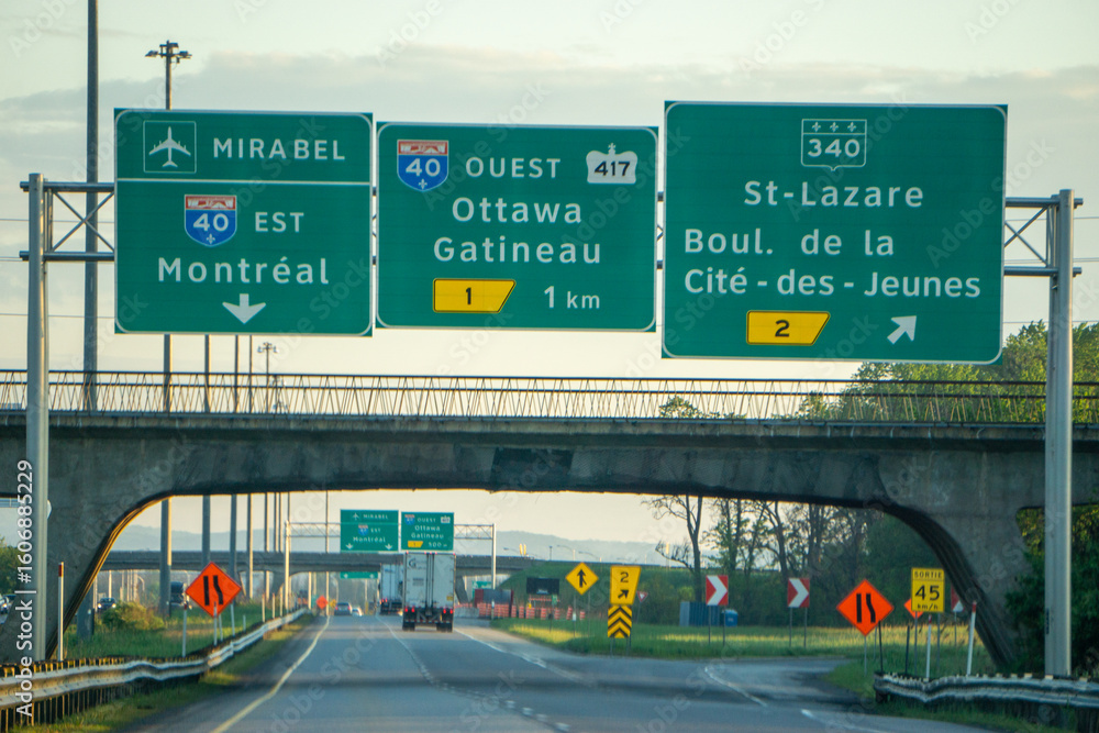 Fototapeta premium highway signs on the way to montreal canada inside canada