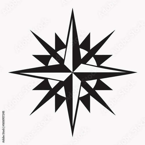 A striking black and white graphic of a stylized eight pointed starburst resembling a compass rose or wind rose with sharp geometric points and intricate detailing